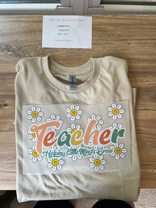 Teacher- helping little minds grow