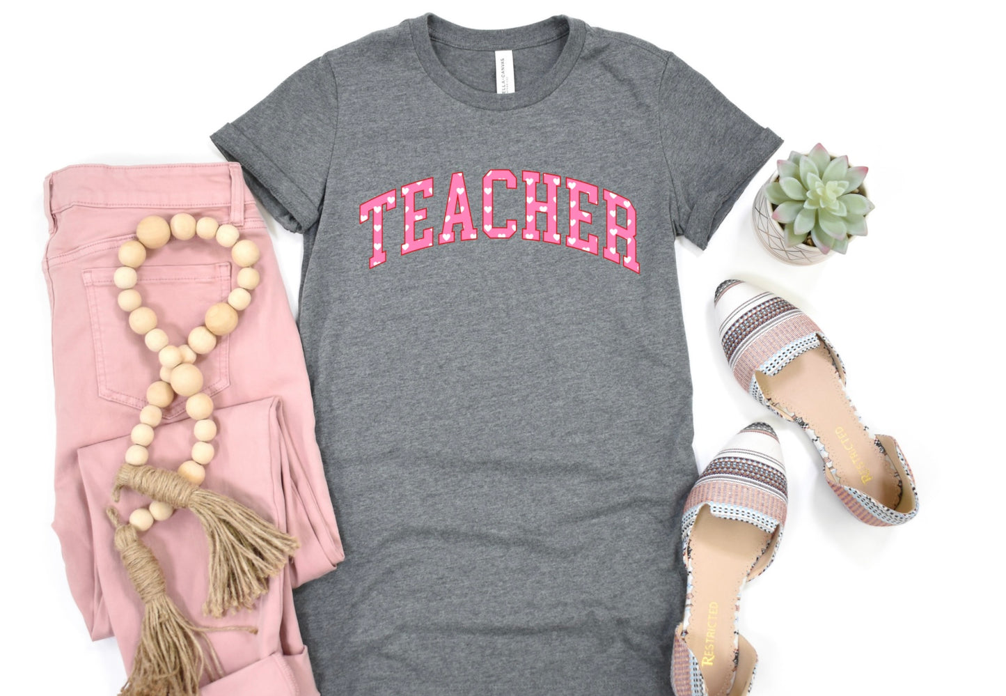 Teacher arched with hearts