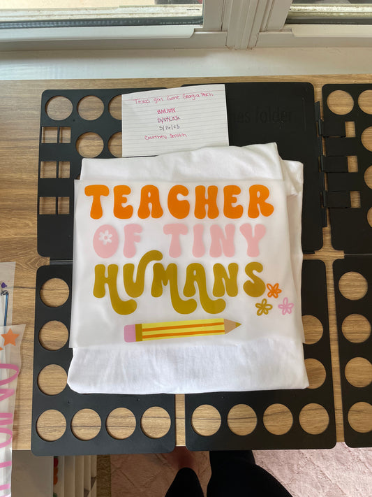 Teacher of tiny humans